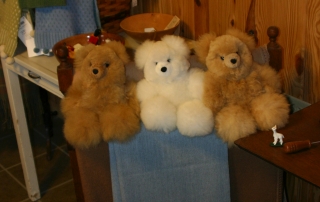 a variety of products made from alpaca fiber
